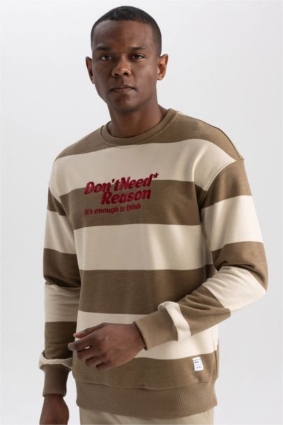 سويت شيرت اوفر سايز بياقة مستديرة