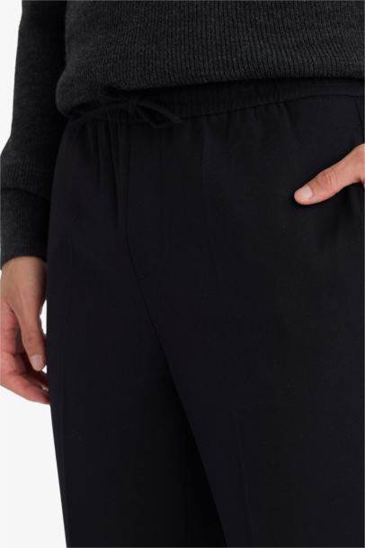 بنطرون جوجر فيت برجل عادي