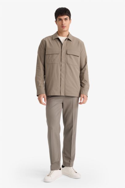 Эластичные во всех направлениях брюки Regular Fit с прямыми штанинами