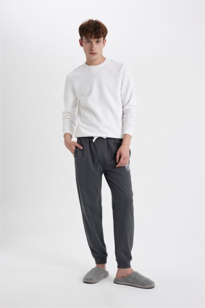 بنطلون بيجاما قصة عادية بجيب