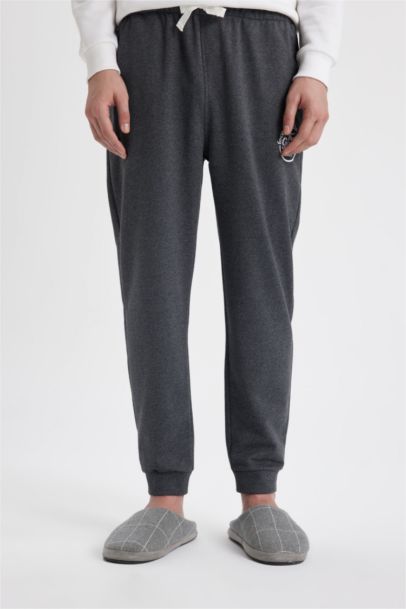 بنطلون بيجاما قصة عادية بجيب