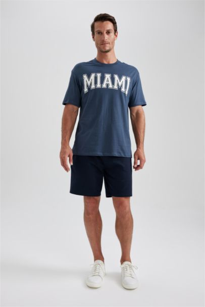 تي شيرت نص ردن بياخة مستديرة وقصة عادية