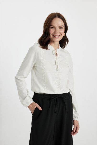 تي شيرت كم طويل قصة عادية برقبة مستديرة