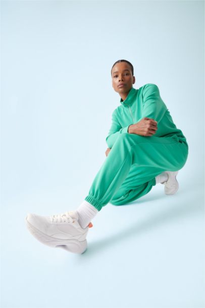 بنطرون بجامة رياضي قصة عادية بجيب من DeFactoFit