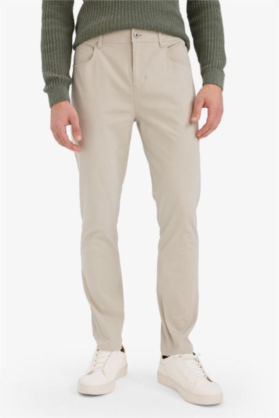 Pantalon slim fuselé avec poches