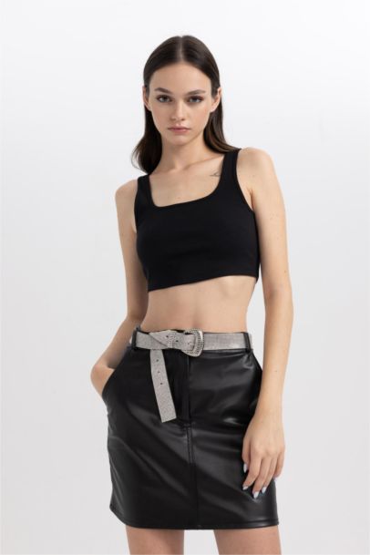 A Cut Faux Leather Mini Skirt