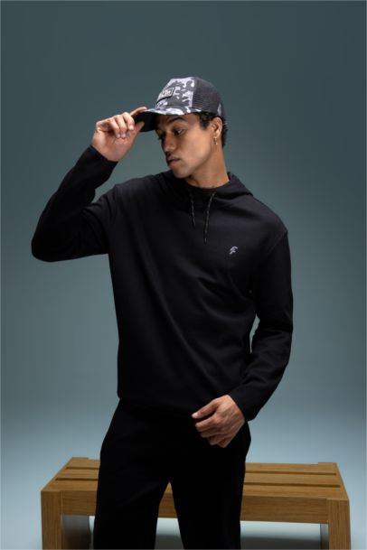 سويت شيرت قصة عادية بغطاء للرأس من DeFactoFit