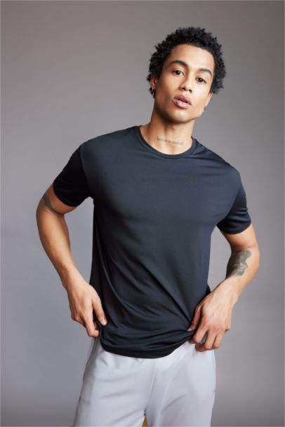 تيشيرت أسود نص كم قصة عادية برقبة مستديرة من DeFactoFit