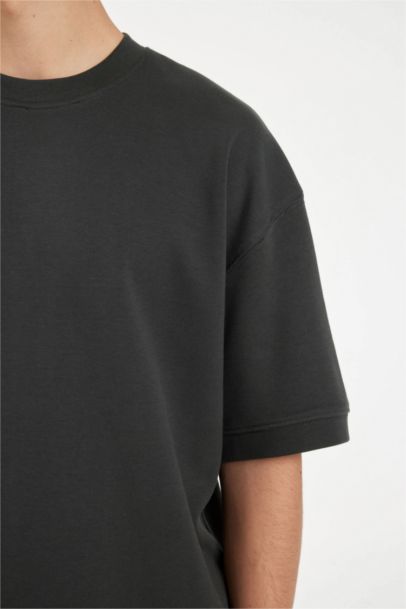 تيشيرت نص ردن قصة فضفاضة بياخة مستديرة