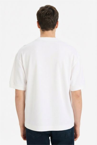 تيشيرت نص كم قصة فضفاضة قماش يسمح بمرور الهواء