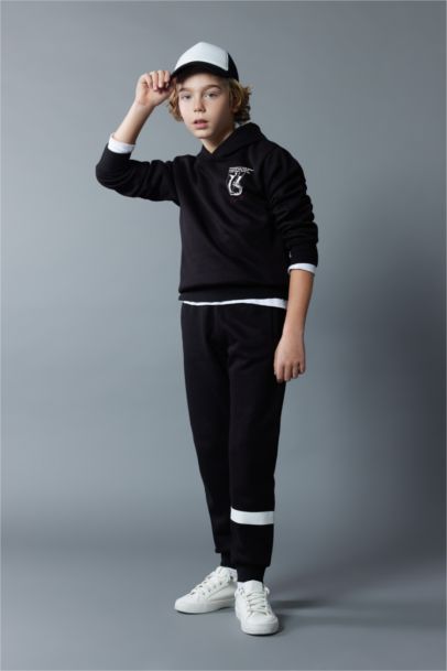 بنطلون سويت بانتس اولادي تقيل قصة عادية بأستك من تحت