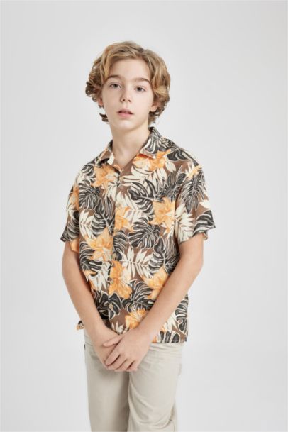 قميص بولو اولادي نص كم فيسكوز اوفر سايز