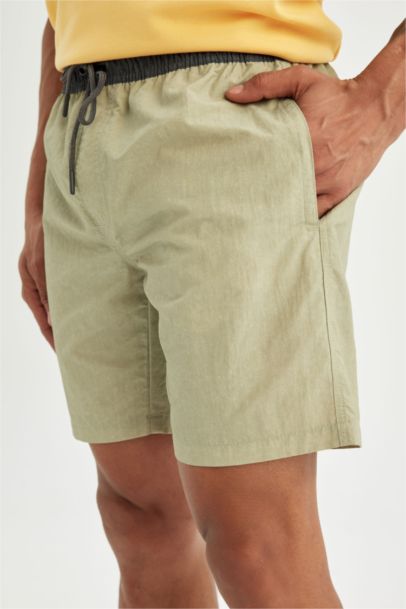 شورت بحر قصير قصة عادية ببطانة شبكية