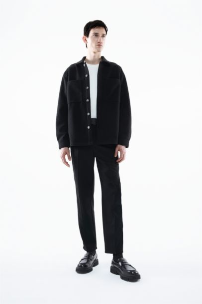 قميص قصة مريحة بياخة بولو بجيب ذو مظهر صوفي