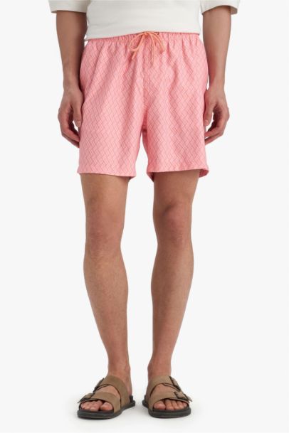 Short de bain court imprimé avec doublure en filet