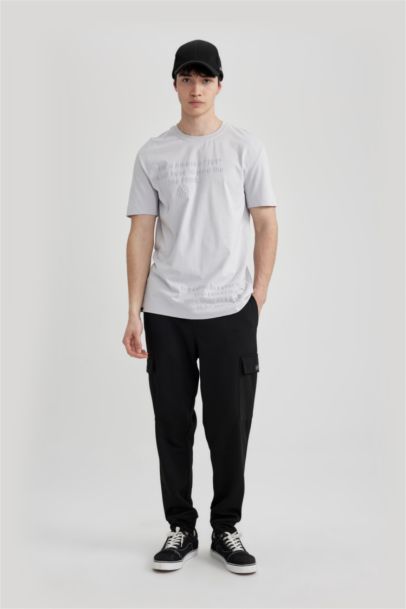 تيشيرت نص كم قصة عادية برقبة مستديرة