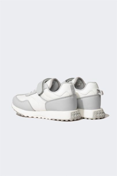 سنيكرز بناتي جلد صناعي رمادي بكعب عالي