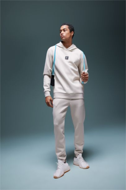 بنطلون بجامة رياضي قماش سكوبا سليم فيت برجل مطاطي