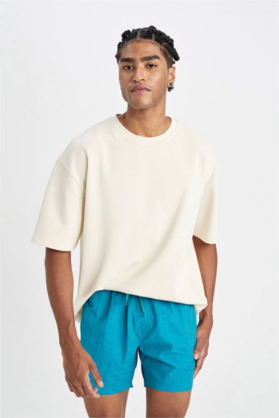 شورت بحر قصير ببطانة شبكية