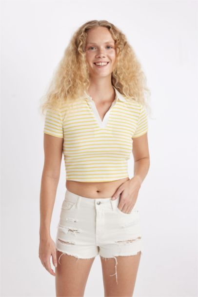 شورت جينز بخصر عالي وحافة ممزقة