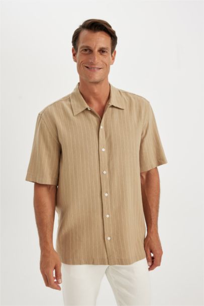 قميص بولو كتان مخطط قصة مريحة