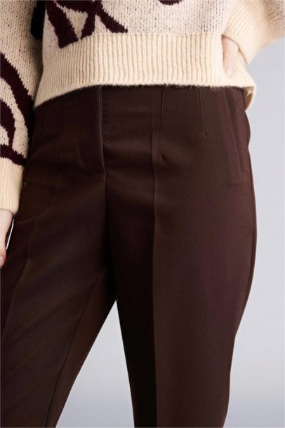 Carrot Fit Super Skinny Hem Zipper Trousers