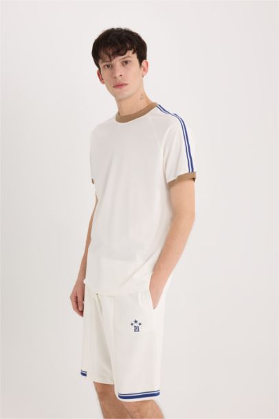 تيشيرت نص ردن بيكيه قصة عادية بياخة مستديرة