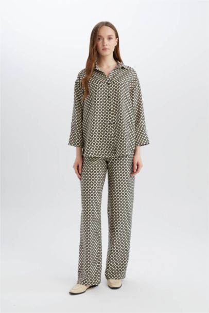 قميص ردن طويل منقوش قصة عادية