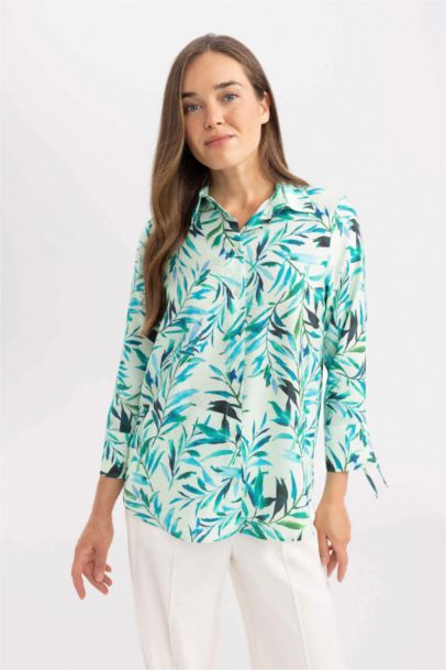 قميص ردن طويل قصة عادية منقوش