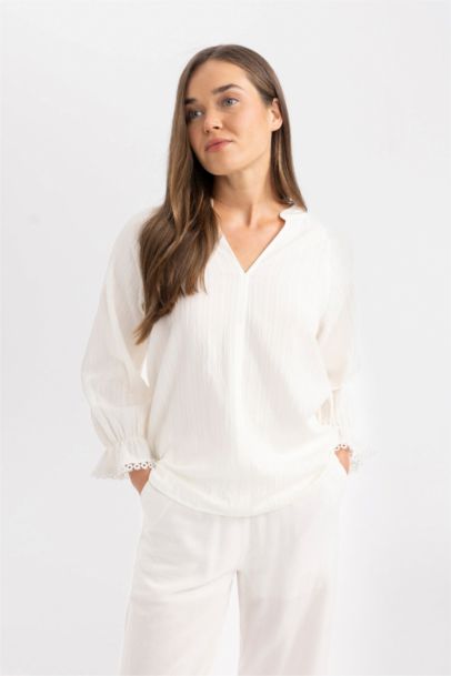 بلوزة ردن طويل اوفر سايز بياخة V