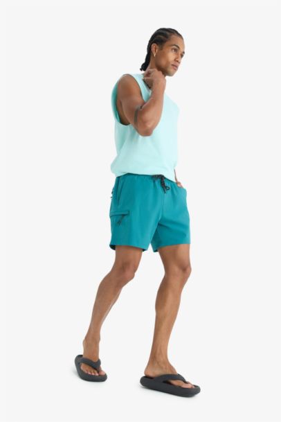 ДефактоФит спортивные короткие шорты с эластичной текстурой и принтом