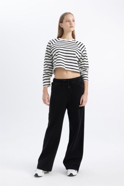 بنطلون بجامة رياضي قماش سميك وايد ليج برجل واسع