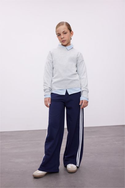 بلوفر تريكو بيزك بناتي قصة عادية برقبة مستديرة ميلانج رمادي فاتح