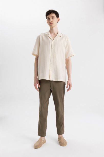 قميص بولو نص كم قصة مريحة برقبة جاكيت