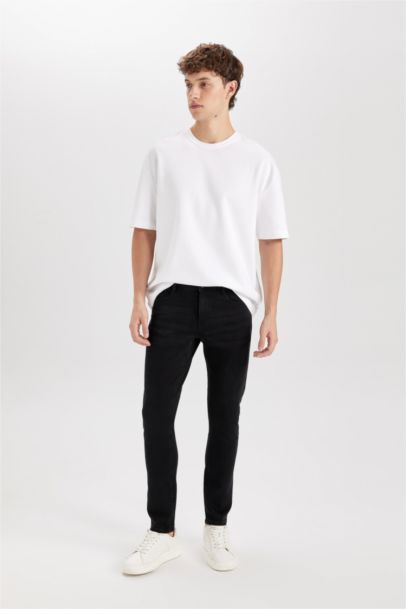 بنطلون جينز كارلو سكيني فيت برجل ضيق وخصر عادي