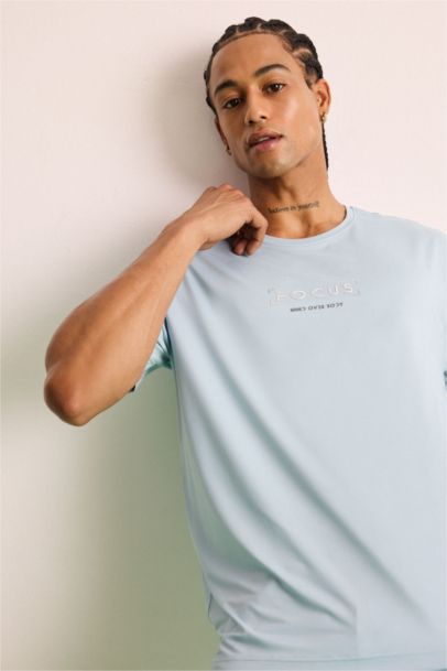 تيشيرت رياضي نص كم قصة عادية مطبوع من DeFactoFit