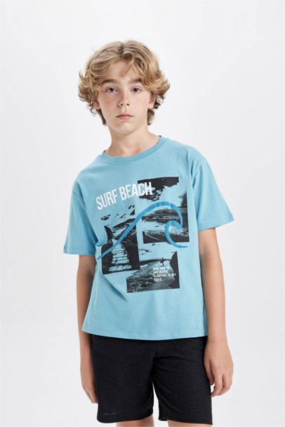 طقم اولادي شورت وتيشيرت - قطعتين