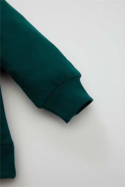 طقم بيبي اولادي بطبعة شعار بكابيشون - قطعتين