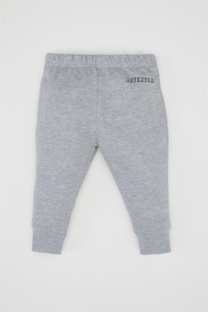 طقم بيبي اولادي سويت شيرت وسويت بانتس بطبعة شعار - قطعتين