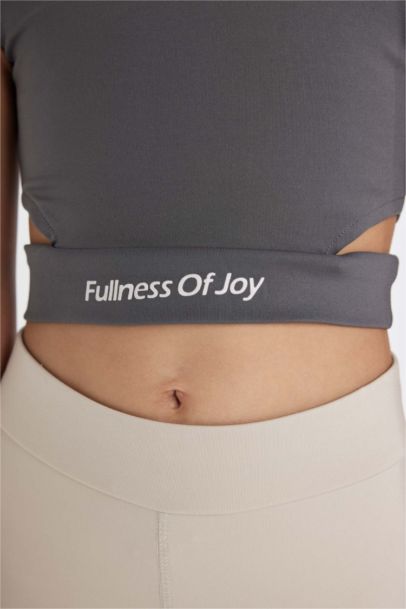 كروب توب بناتي رياضي بدون ردن بياخة مستديرة