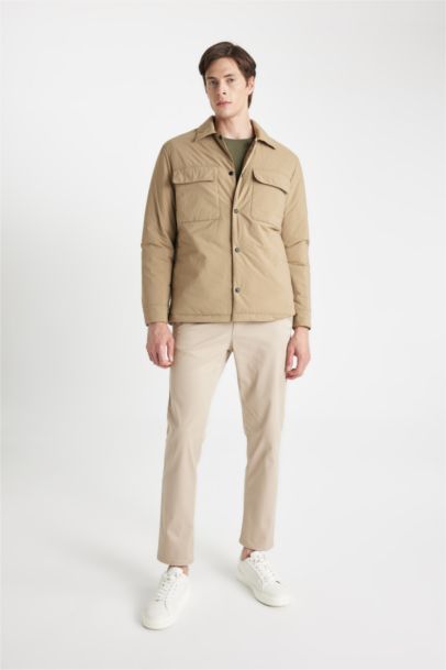 قمصلة نفخ سليم فيت بياقة قميص بجيب مقاوم للماء