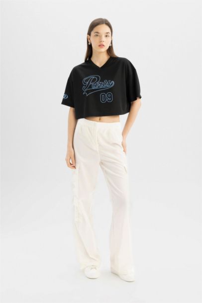 تيشيرت نص كم واسع مطبوع برقبة V