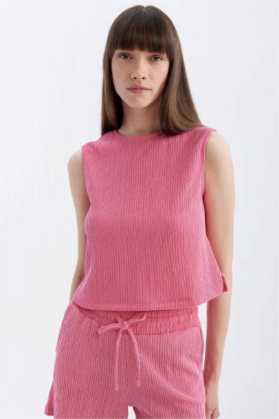 Top sans manches coupe régulière à col rond