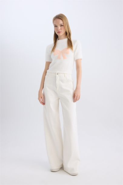 Pull tricot à col rond et coupe régulière