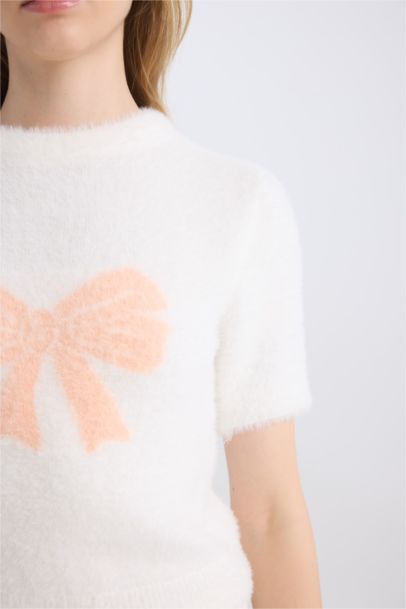 Pull tricot à col rond et coupe régulière