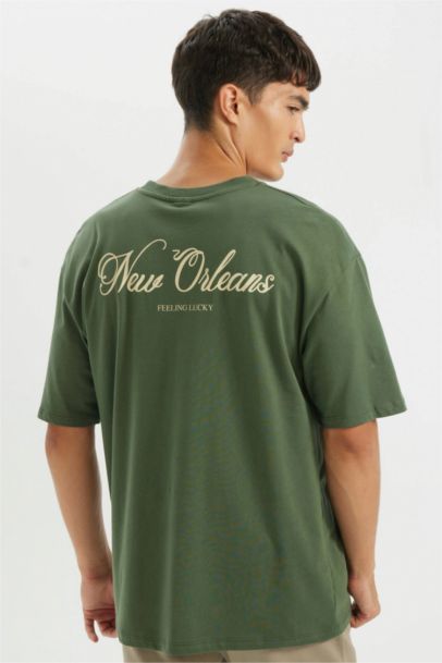 %100 Pamuk Oversize Geniş Kalıp Bisiklet Yaka Sırt Baskılı Kısa Kollu Tişört