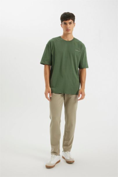 %100 Pamuk Oversize Geniş Kalıp Bisiklet Yaka Sırt Baskılı Kısa Kollu Tişört