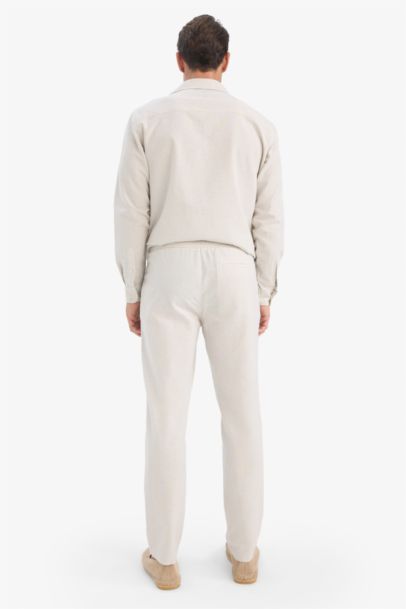 Pantalon slim droit en coton à taille élastique aspect lin avec poches