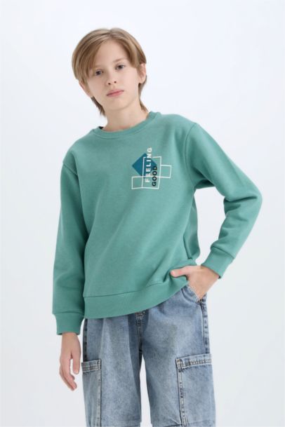 سويت شيرت قصة عادية برقبة مستديرة