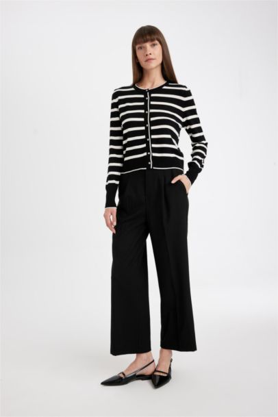 جاكيت تريكو مخطط قصة عادية بياخة مستديرة